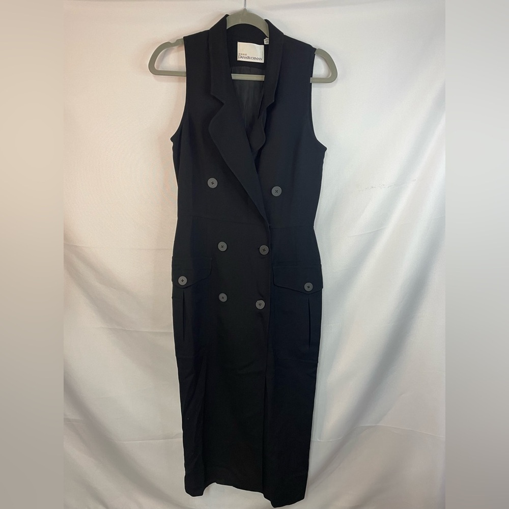 Vintage black wrap suit dress, this is a “power house” suit. Double breasted.